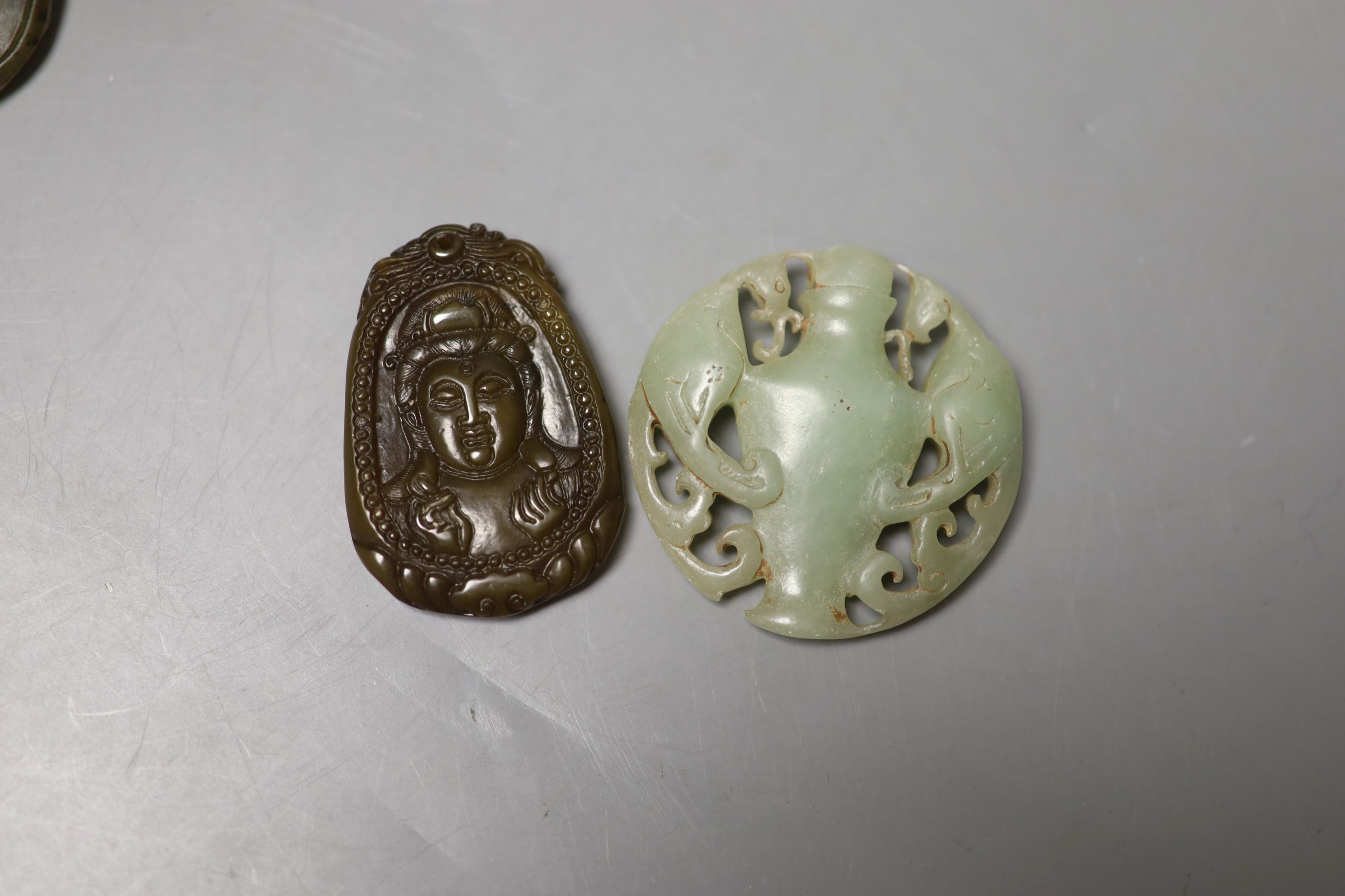 Eight Chinese hardstone pendants